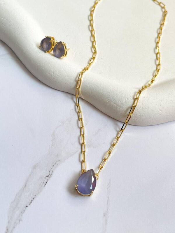 Conjunto cartier gota roxa