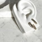 Dupla de argolas torcidas ouro 18k