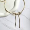 Choker laço ouro 18k