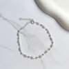 Pulseira bolinhas e pérolas