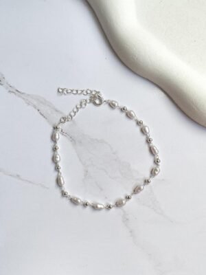 Pulseira bolinhas e pérolas