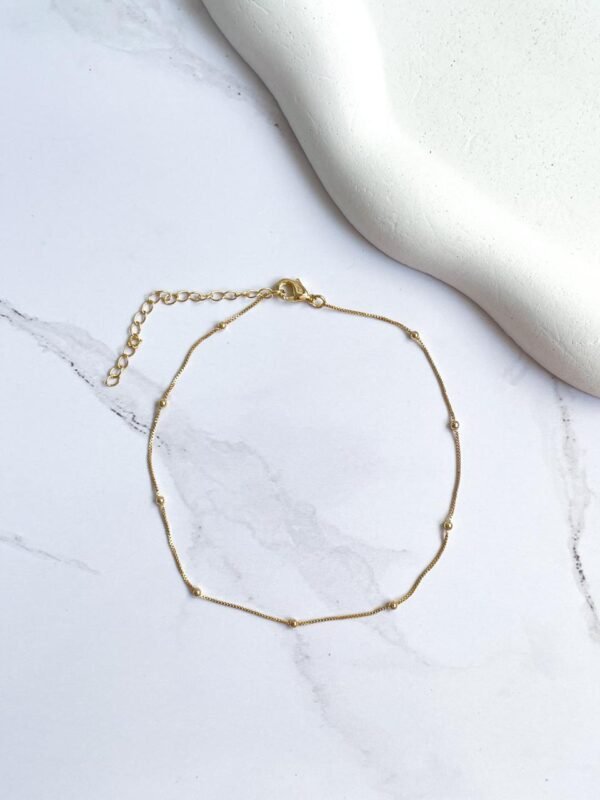 Tornozeleira bolinha ouro 18k