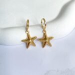 Argola estrela do mar ouro 18k