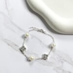 Pulseira trevos e pérolas