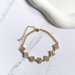 Bracelete trevos pedraria luxo
