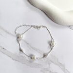 Pulseira pérolas e esferas