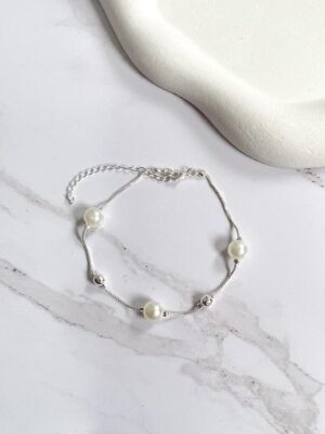 Pulseira pérolas e esferas