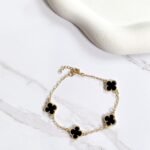 Pulseira trevos pretos ouro 18k