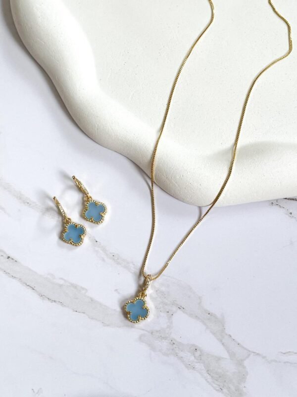 Conjunto trevo azul ouro 18k